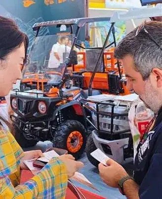 Reviewing a product with a supplier at the fair