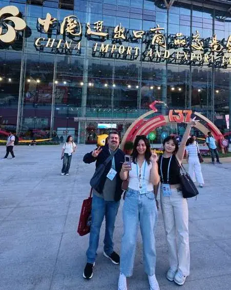 Espinoza Trading team with clients at the Canton Fair entrance